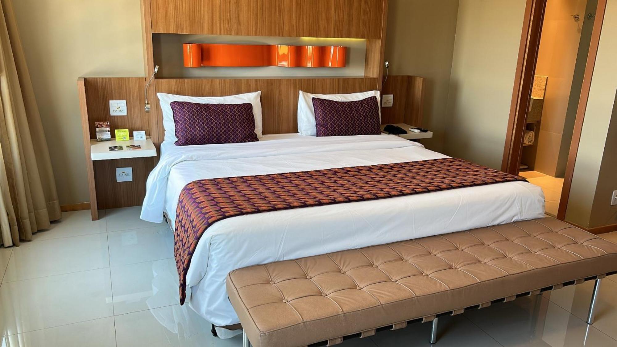 Jade Hotel Brasilia Candangolandia Экстерьер фото A bed in a hotel room